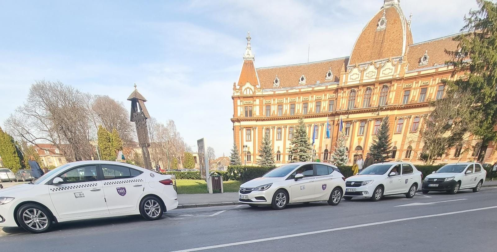 Taxis waiting for passengers in Brașov