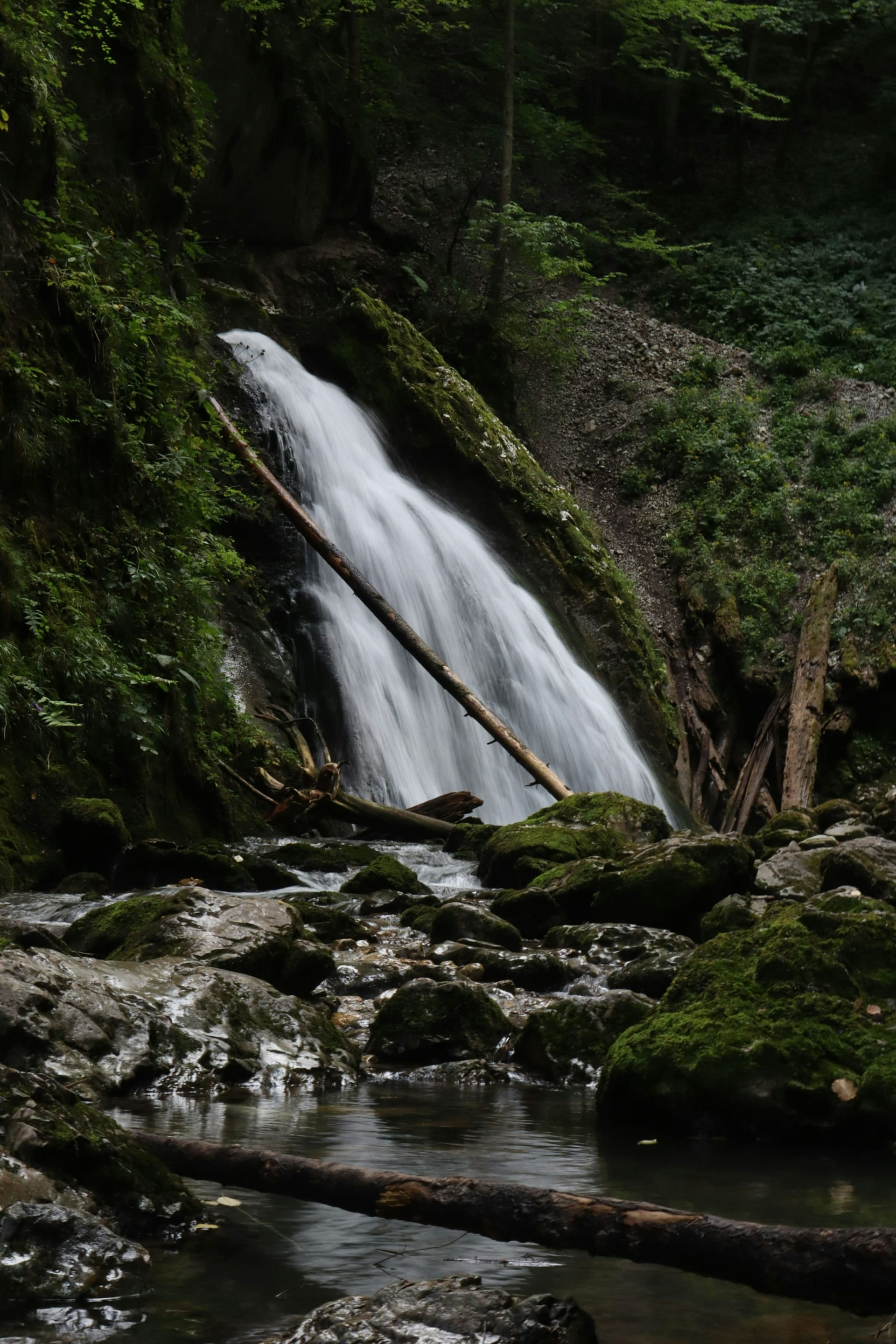 Metal walkway beside a waterfall inside Seven Ladders Canyon