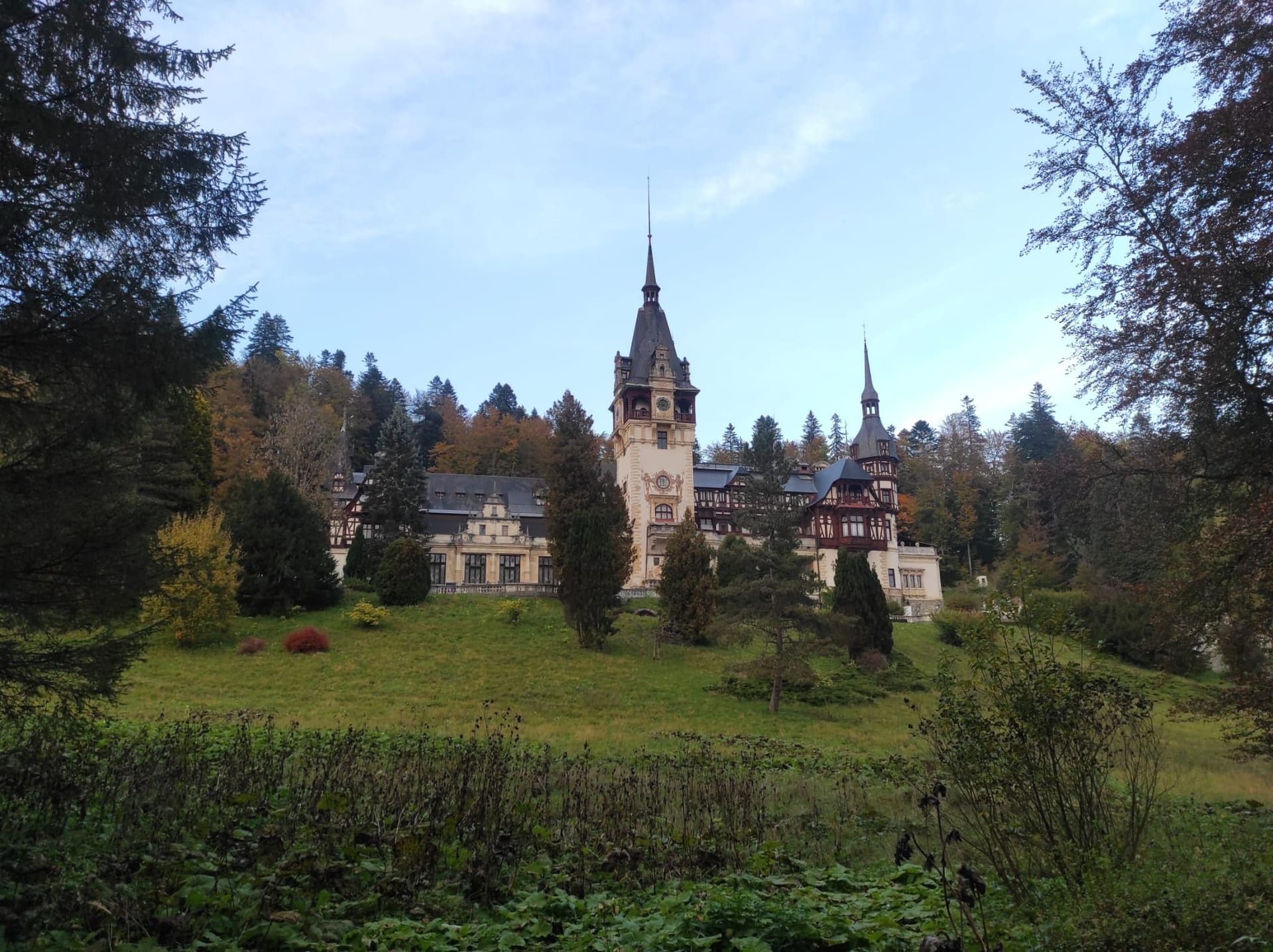 Peleș Castle framed by the forests of Sinaia