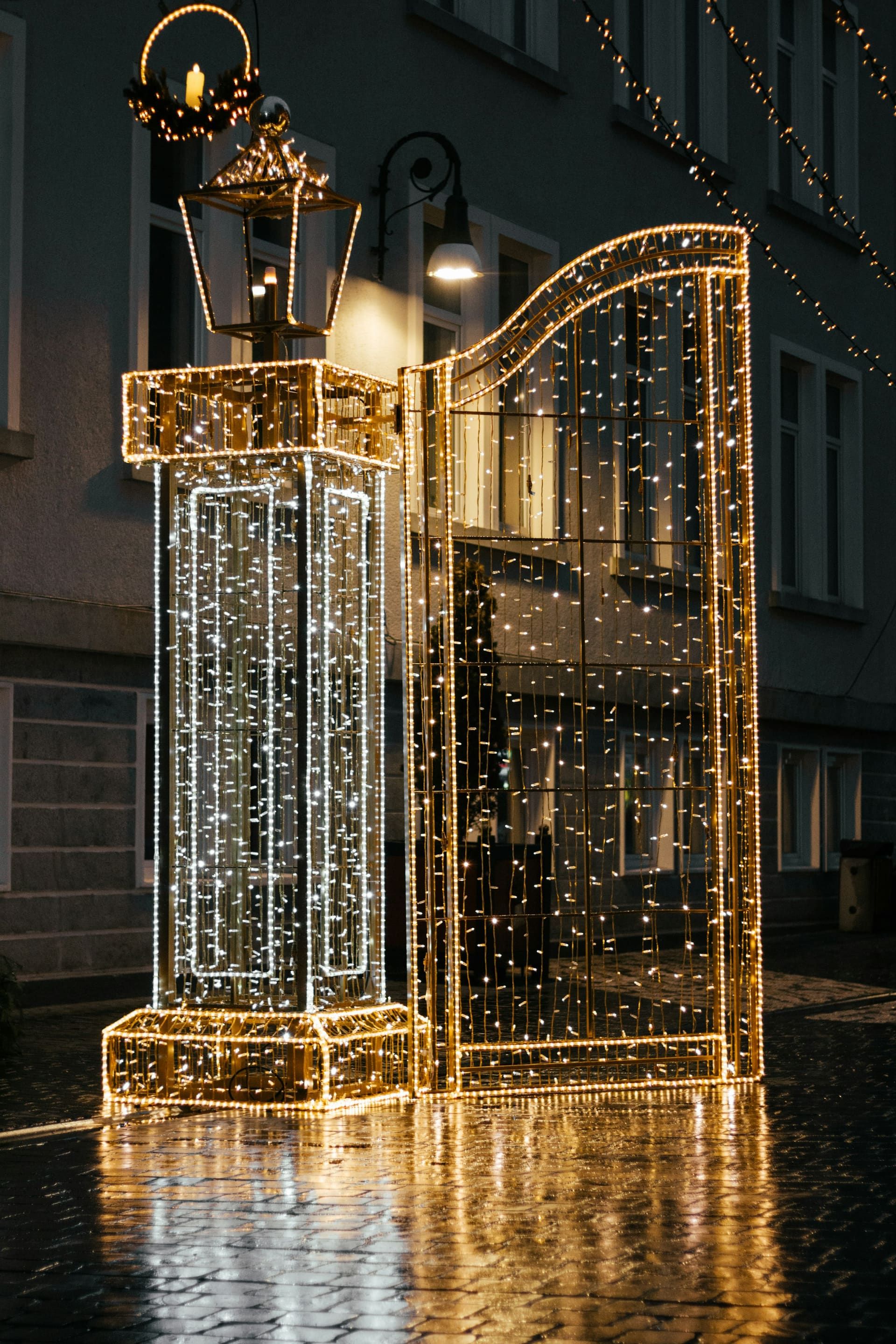 Festive lights leading into Brașov’s historic center at night