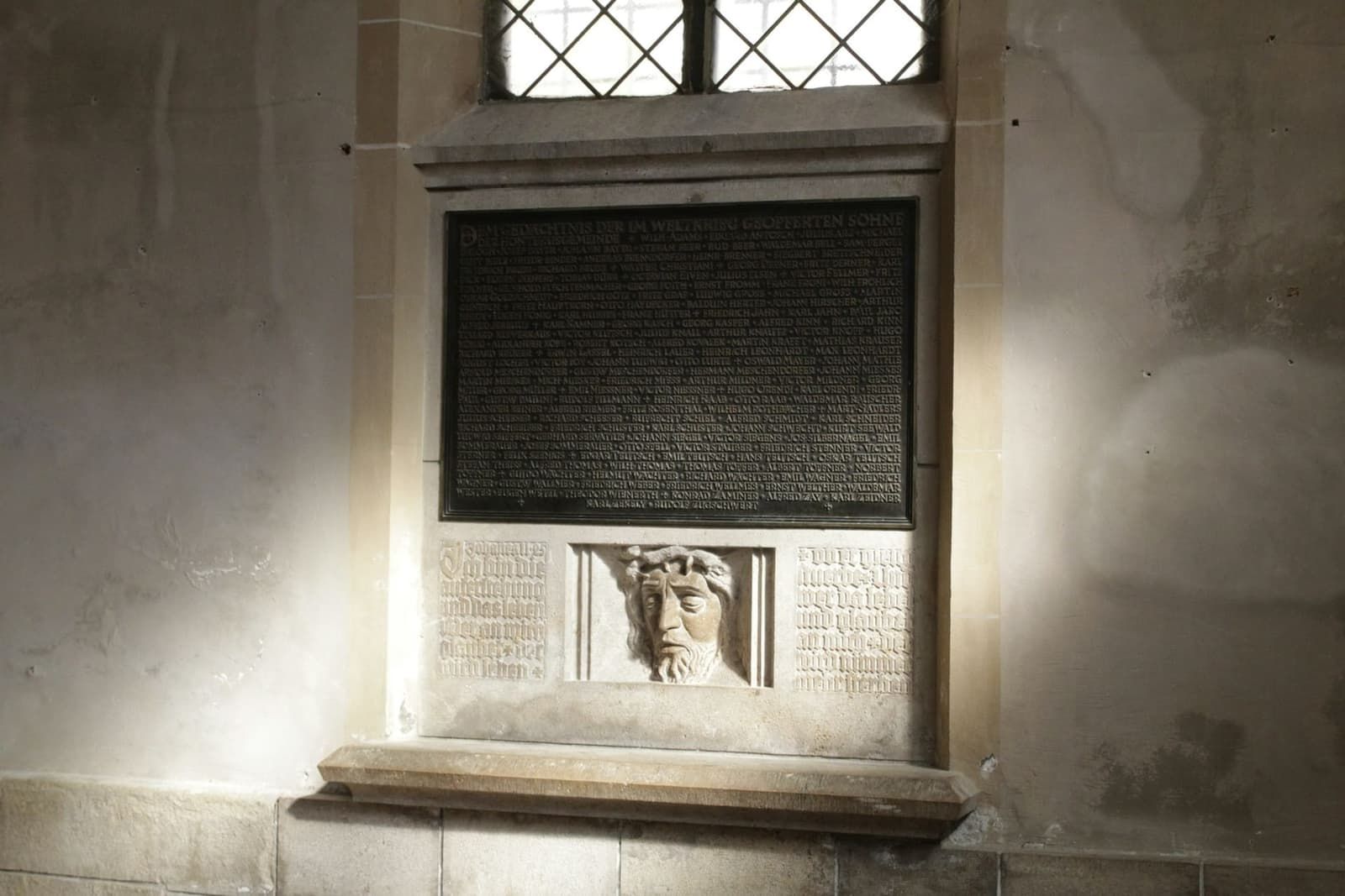 Statue of Johannes Honterus standing beside the Black Church