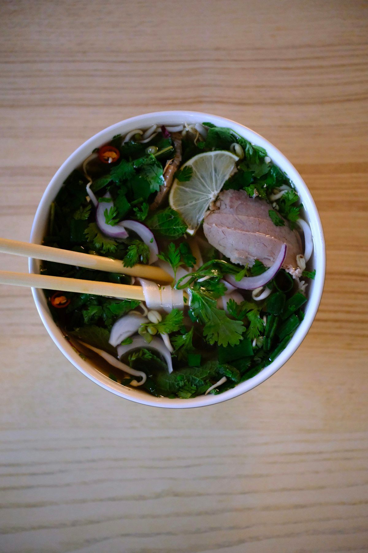 Warm traditional soup in a ceramic bowl